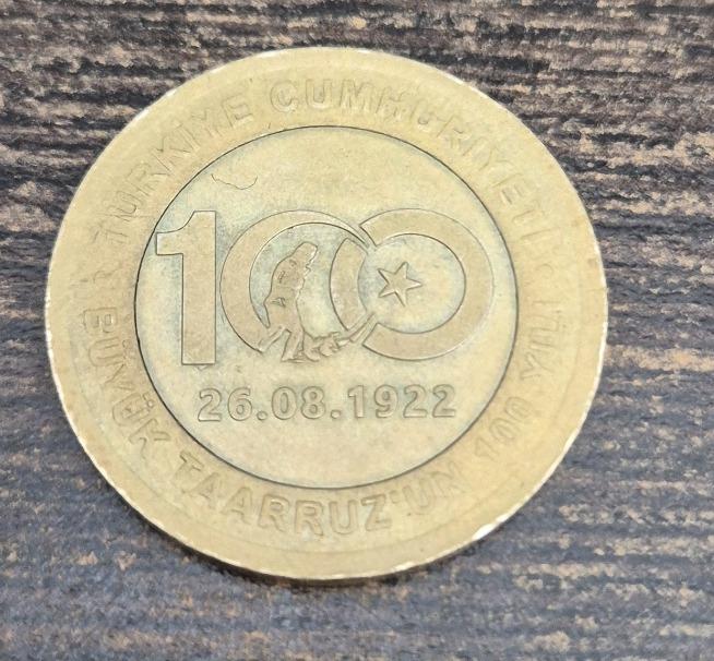 1 TL 100. YIL